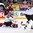 COLOGNE, GERMANY - MAY 16: Germany's Philipp Grubauer #30 makes the save while Denis Reul #2 and Latvia's Andris Dzerins #25 look on during preliminary round action at the 2017 IIHF Ice Hockey World Championship. (Photo by Andre Ringuette/HHOF-IIHF Images)

